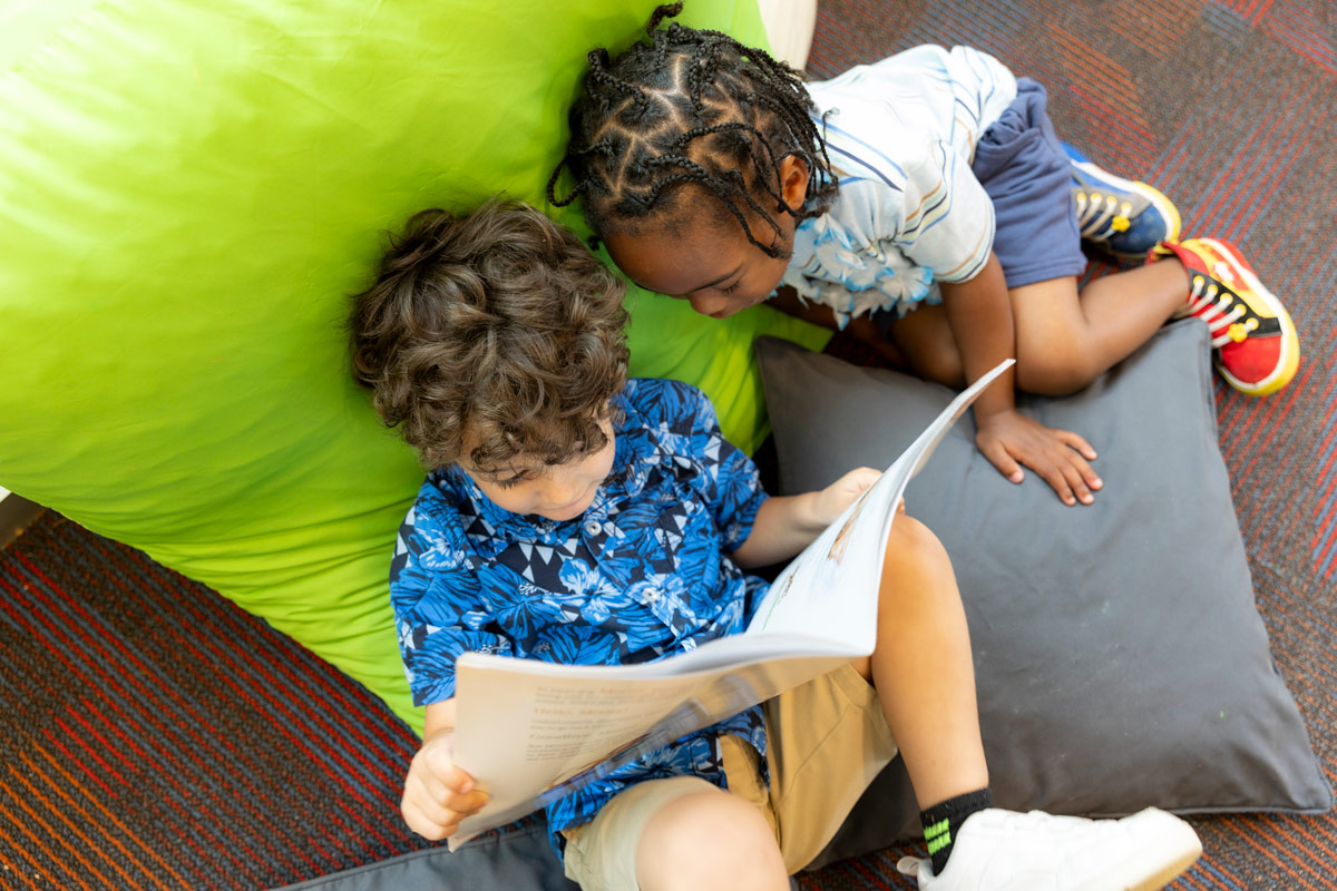 Children reading at the New E3 School.