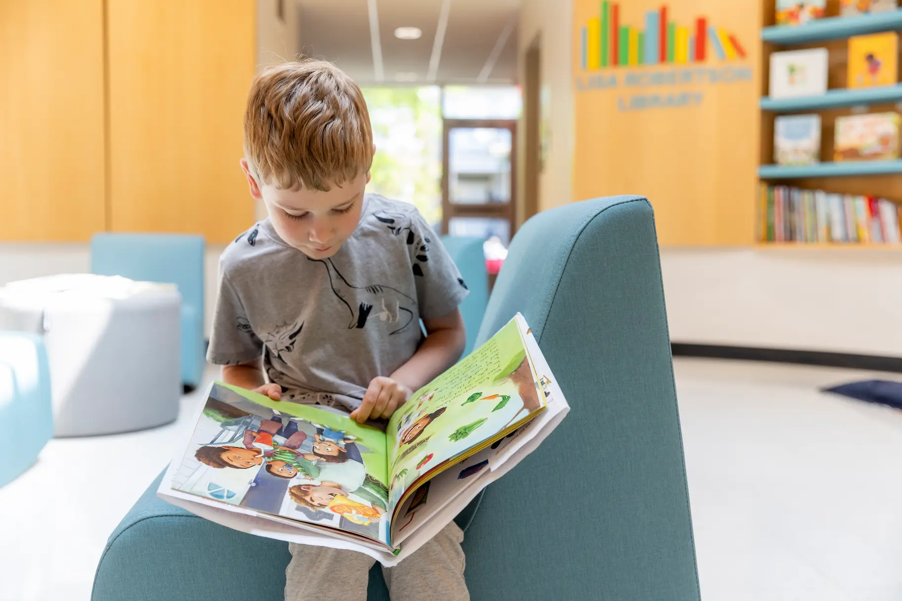 Teacher working with young students