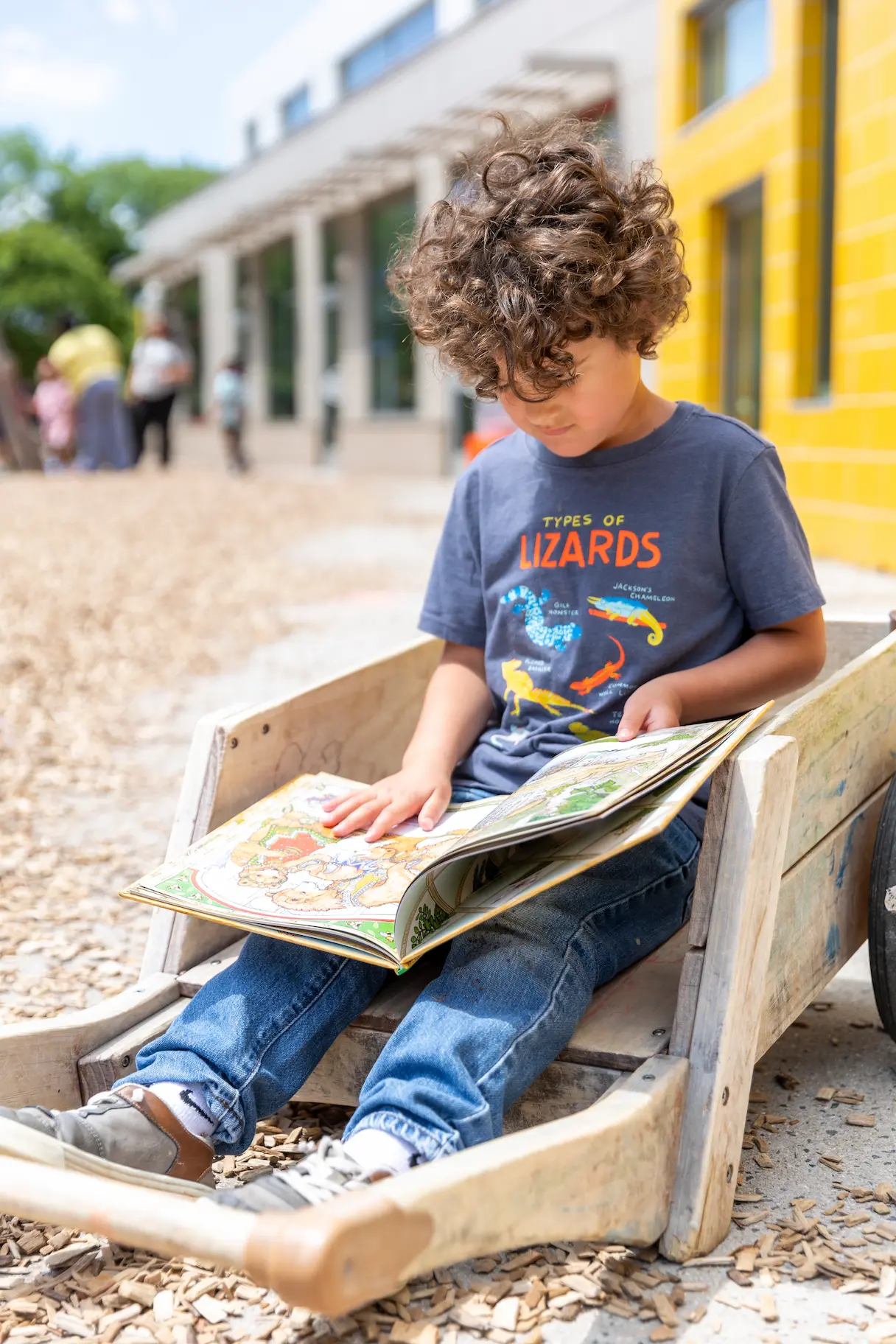 Teacher working with young students
