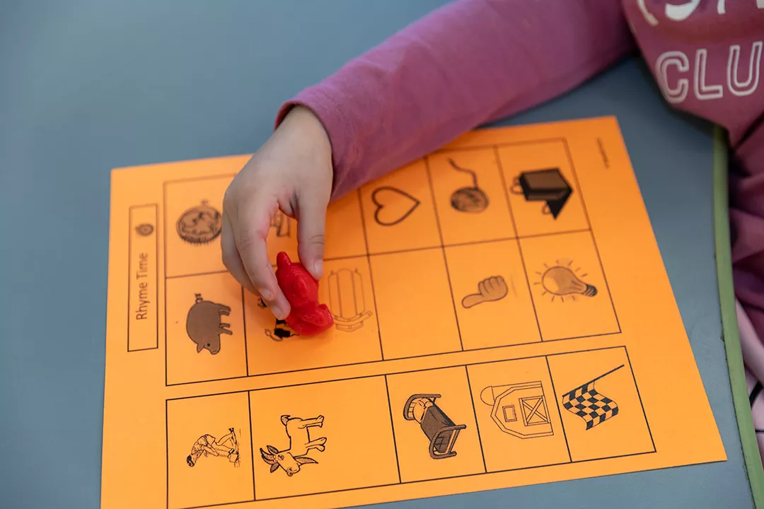 Student doing activities with their class.